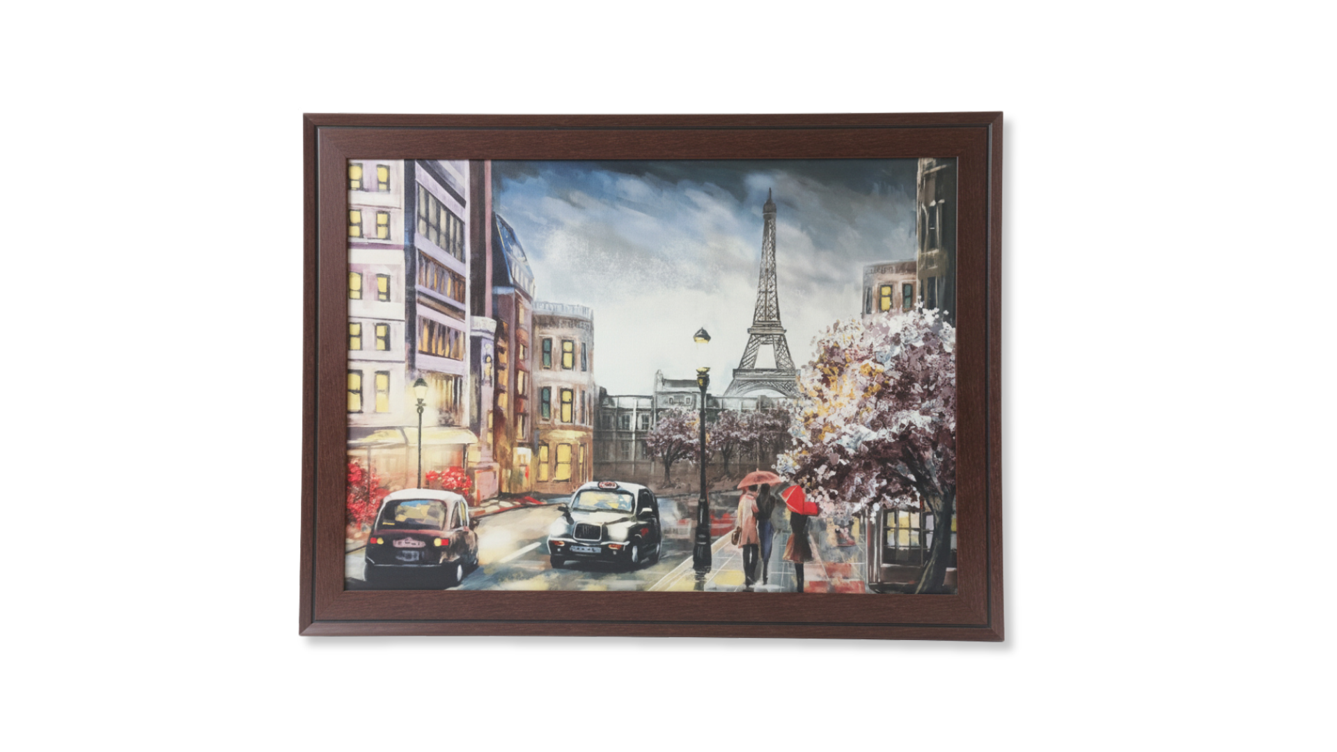 Framed artwork of a city street scene with the Eiffel Tower.