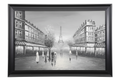 Framed black and white artwork of a city street with the Eiffel Tower in the background.