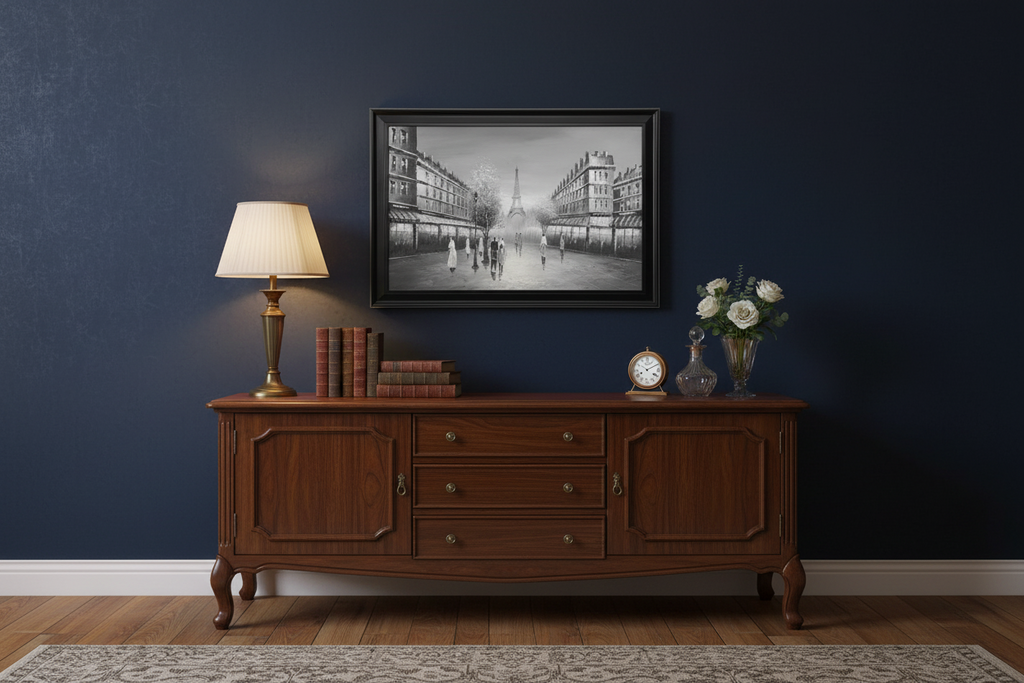 Framed artwork of a city street scene with the Eiffel Tower in the background.