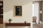 Framed poster with motivational quote 'Mistakes are proof that you are trying' on a white background