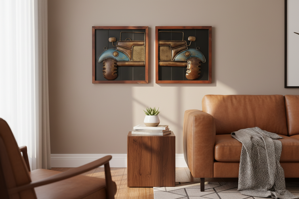 Two framed metal sculptures of vintage cars on a white background