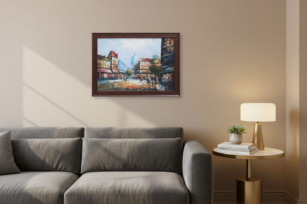 Framed painting of a city street scene on a white background