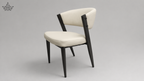 Chair with white cushioned seat and backrest on a gray background