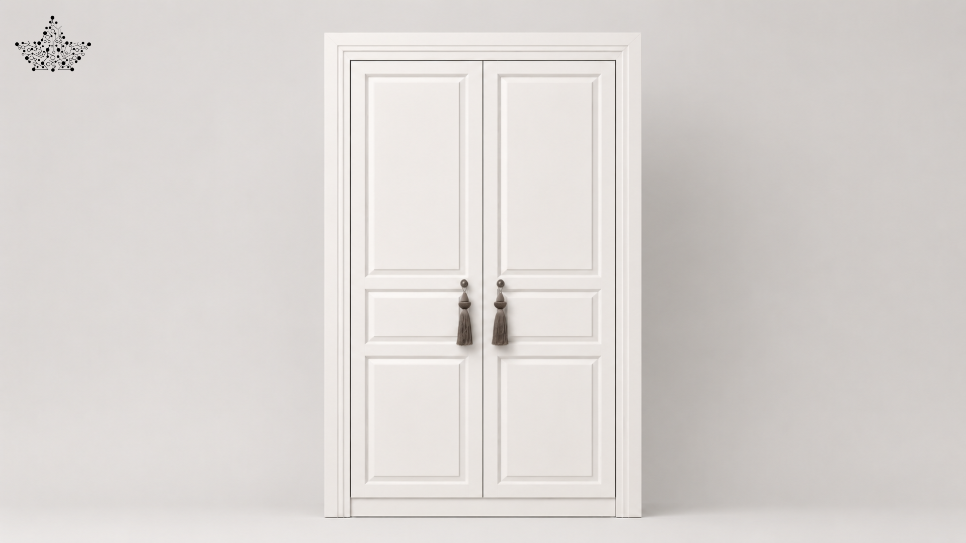 White double door wardrobe with decorative handles on a light gray background