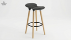 Bar stool with black woven seat and wooden legs on a white background
