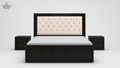 Black bed frame with white tufted headboard on a light gray background