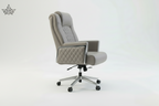 Gray office chair with quilted design on a white background