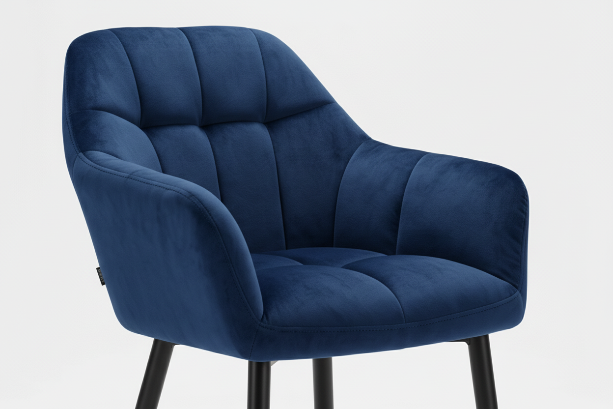 Blue velvet chair with gold legs on a white background