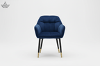 Blue velvet chair with gold legs on a white background
