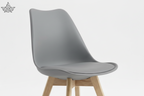 Gray chair with wooden legs on a white background