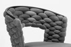 Gray chair with braided backrest on a white background