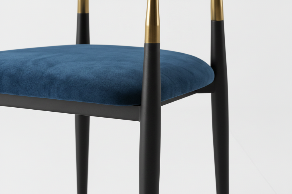 Chair with white backrest, blue seat, and gold armrests on a light gray background