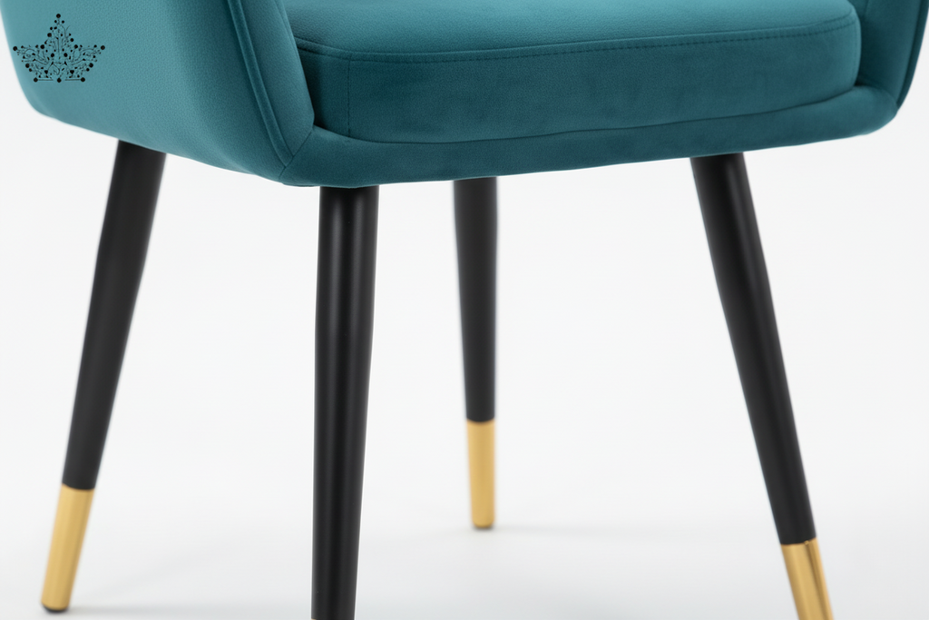 Teal armchair with black legs on a white background
