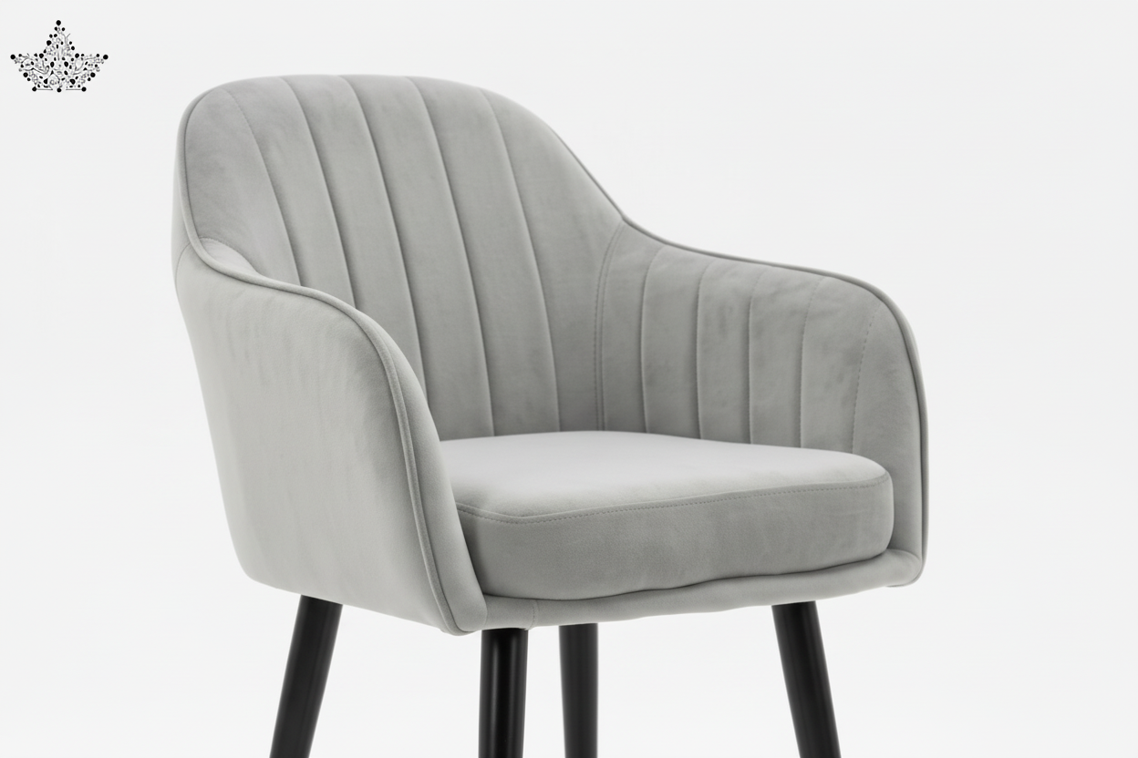 Gray upholstered chair with black legs and gold feet on a white background
