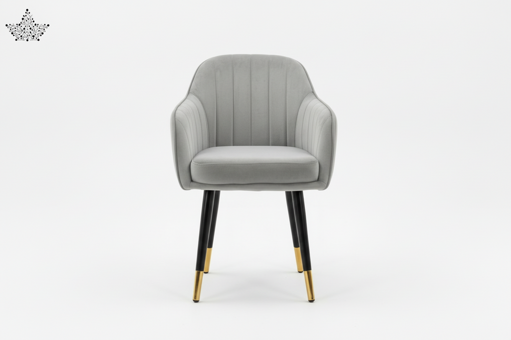 Gray upholstered chair with black legs and gold feet on a white background