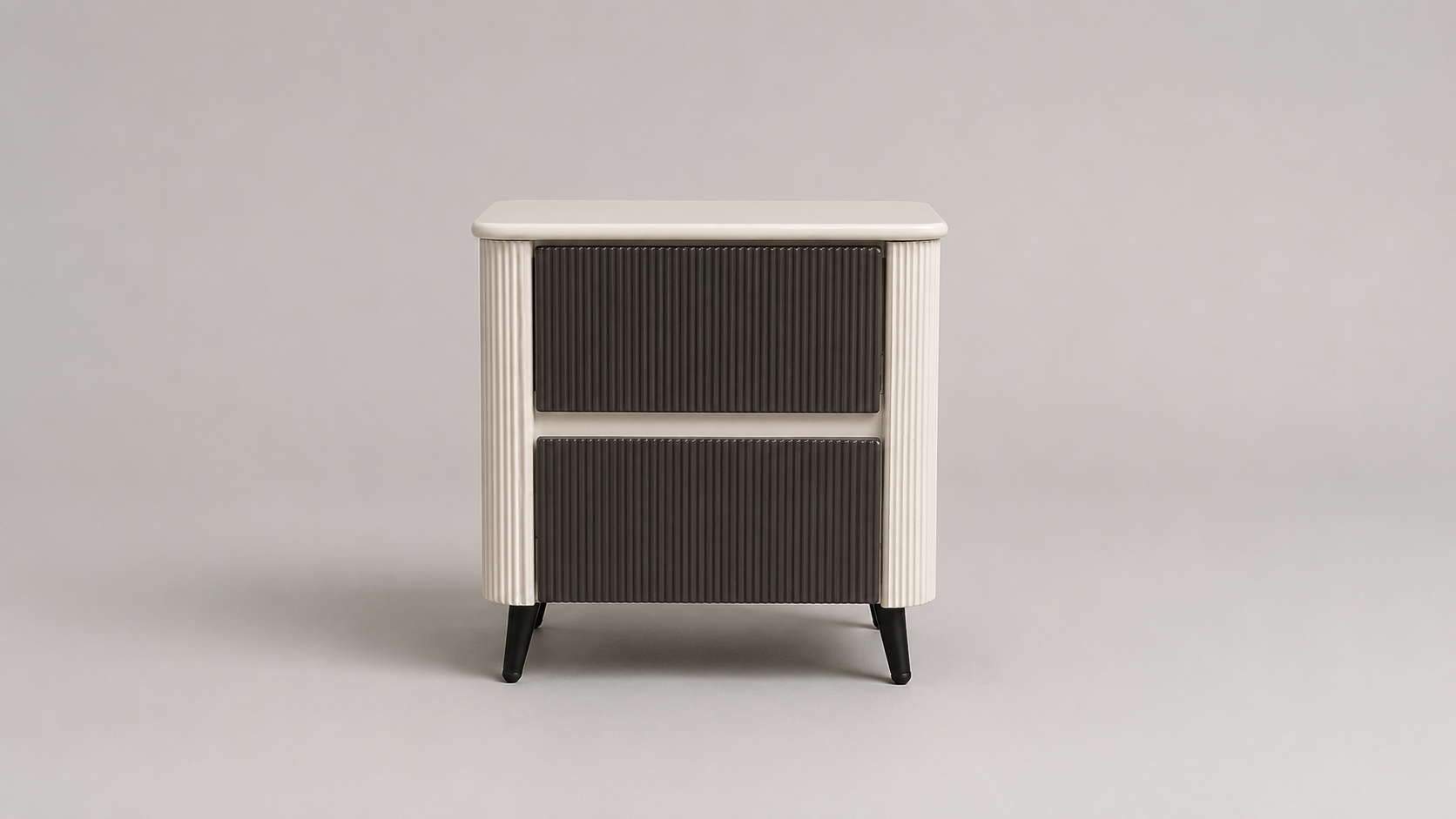 A modern two-drawer nightstand or side table with a cream-colored frame, vertically ribbed dark charcoal front panels, and tapered black legs, shown against a neutral light gray background.