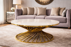 Modern living room with a gold coffee table and gray sofa.