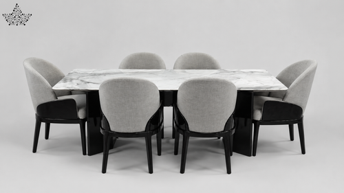 A modern dining set featuring a rectangular white marble table with a black base, surrounded by six upholstered dining chairs with light gray fabric and black wooden legs, set against a seamless light gray studio background.