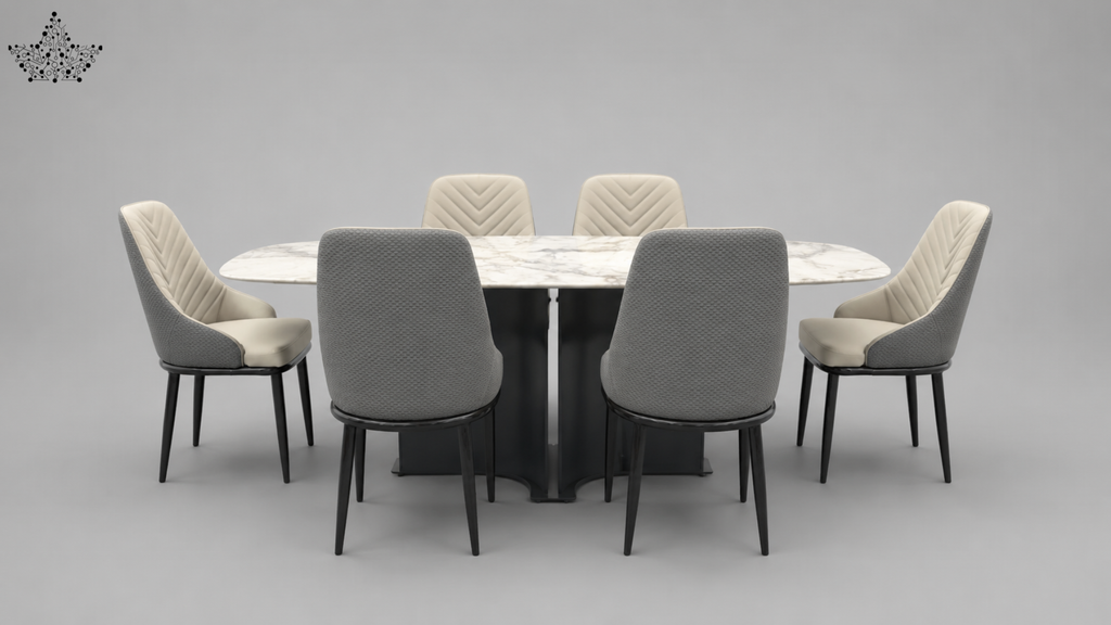 A modern dining set featuring a round white marble-top table with a black pedestal base, surrounded by six upholstered dining chairs with gray fabric backs and cream chevron-patterned seats, set against a solid gray studio background.