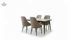 Dining table set with four chairs on a white background