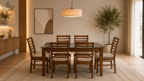 Dining room with wooden table and chairs, neutral decor, and large window.