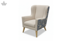 Beige armchair with floral patterned backrest on a white background