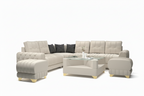 Beige sectional sofa with ottoman in a living room setting.
