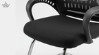 Black office chair with mesh back and seat on a white background