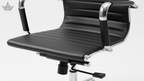Black office chair with chrome accents on a white background
