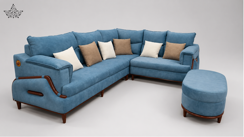 A blue upholstered sectional sofa with matching ottoman, brown wooden arm accents, and several beige and white throw pillows, shown on a light gray studio background.