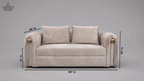 A light beige upholstered loveseat with two matching back cushions, shown on a gray background with dimension callouts indicating 66 in width, 30 in height, 36 in arm depth, and 17 in front depth.