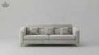 Gray sofa with decorative pillows on a light gray background