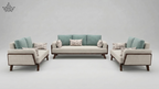 Modern sofa set with light gray and teal cushions on a plain background