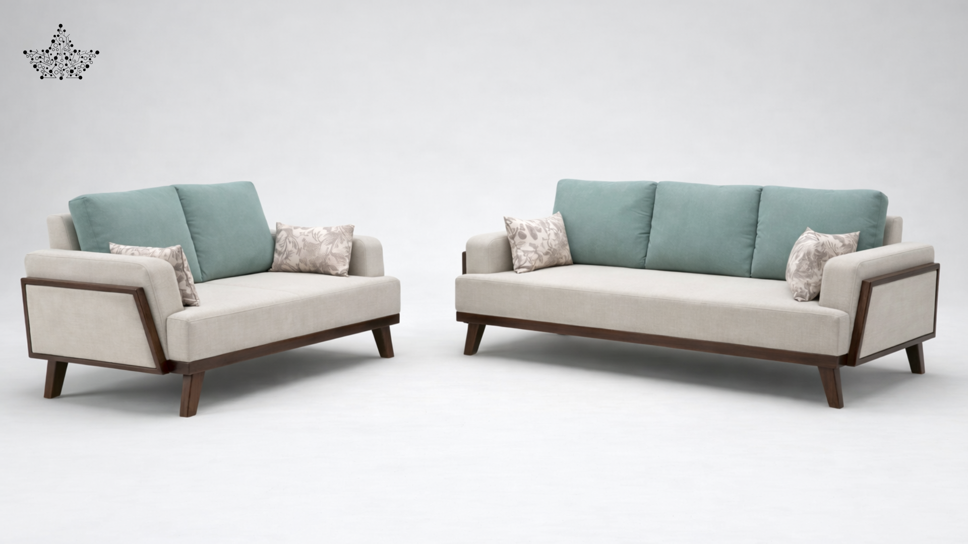Two sofas with light blue cushions on a white background