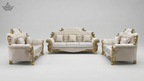 Luxurious white sofa set with gold accents on a gray background