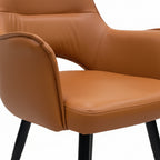 Brown leather chair with metal legs in a showroom setting