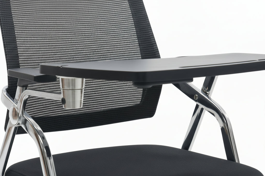 Black office chair with a small table in a showroom setting