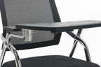 Black office chair with a small table in a showroom setting
