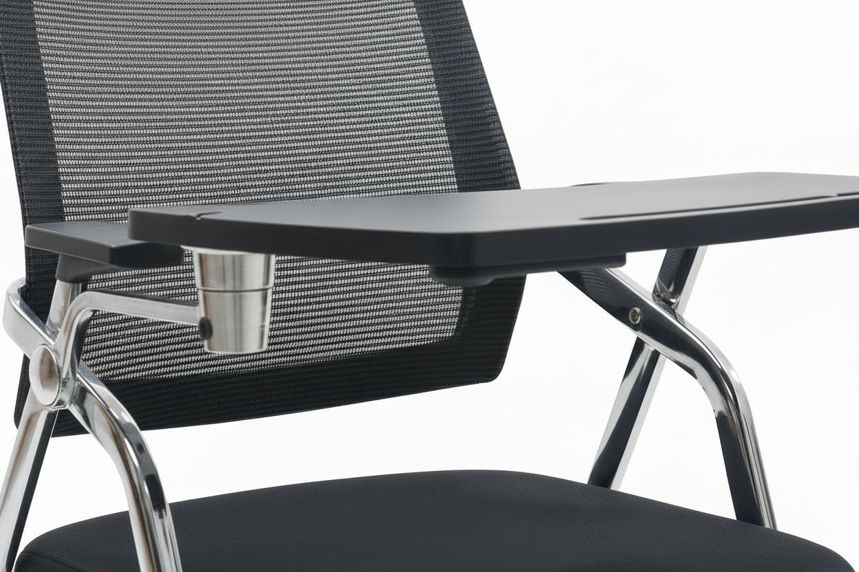 Black office chair with a small table in a showroom setting