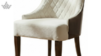 Chair with quilted backrest and plush seat on a white background
