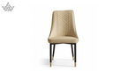 Beige quilted chair with black legs on a white background