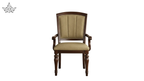 Wooden chair with beige cushioned seat and backrest on a white background