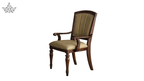 Wooden chair with beige cushion on a white background