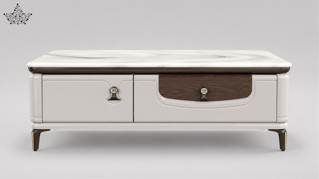 A modern low coffee table with a white faux leather top, featuring a two-drawer front with dark wood inserts and brass-tone hardware, set against a neutral gray background.