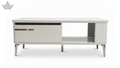 White coffee table with storage compartments on a white background