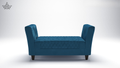 Blue quilted sofa on a white background