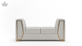 Gray sofa with gold accents on a white background