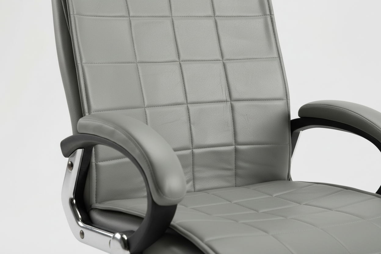 Gray office chair with quilted design on a white background