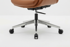 Brown office chair with silver accents on a white background